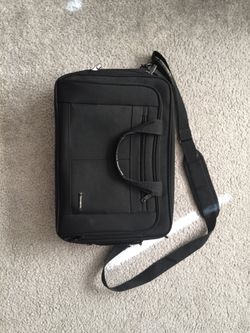 Samsonite laptop bag with strap and extra compartments