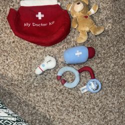 My First Doctors Kit Playset baby gund. Has stains from play. Hasn’t been pretreated or washed so they may come out. I think bear used to make sounds 