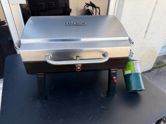 Charbroil 200-Sq. in Stainless Portable Liquid propane Grill BBQ Works Great! Includes 1 propane tank. Retails $123.27