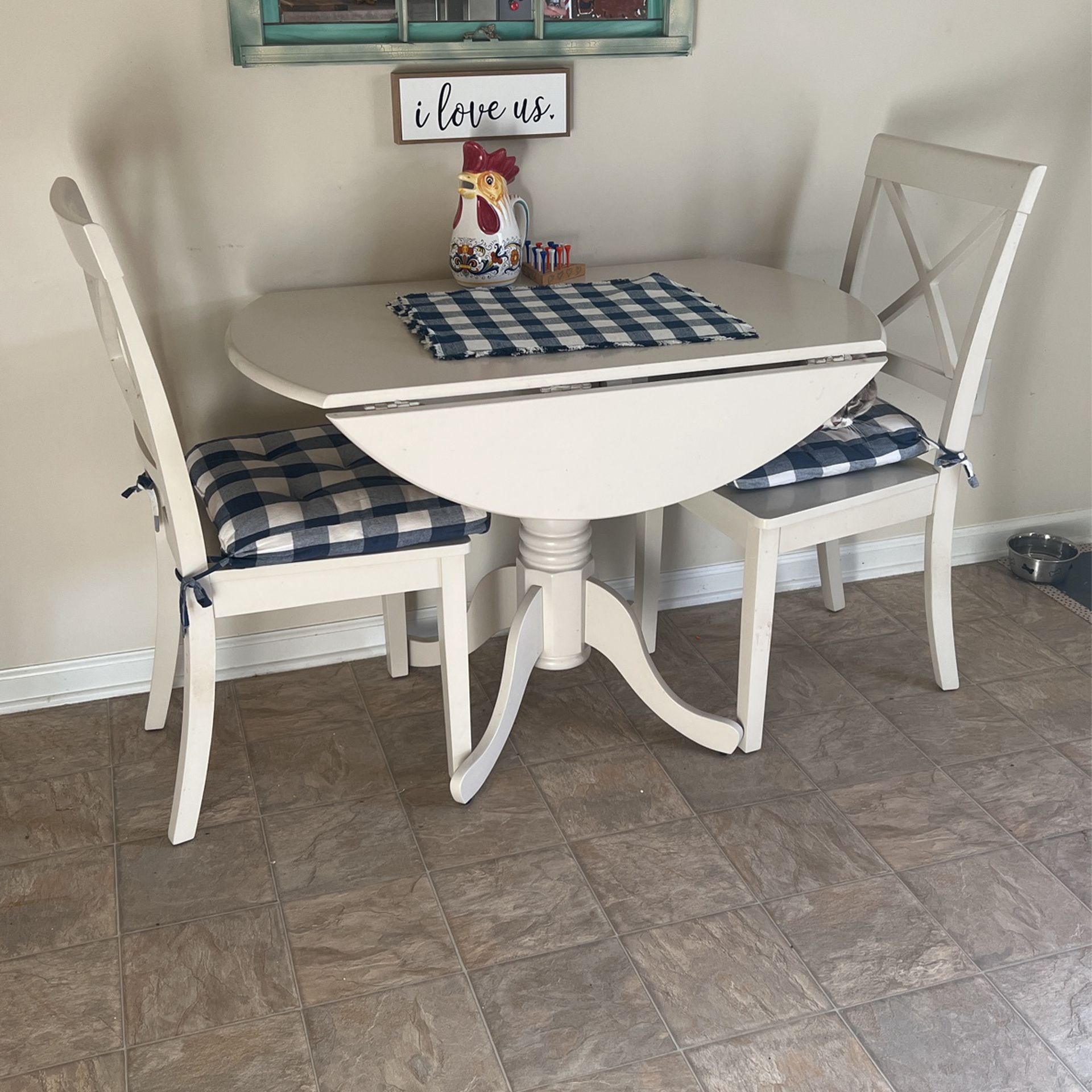 3 -piece kitchen dinette, table and 2 chairs. Drop leaf sides.