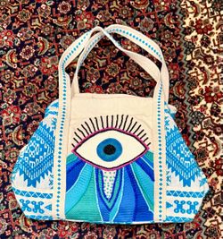 EVIL EYE TOTE BAG EMBROIDERED ZIP TOP /LINED POCKETS.