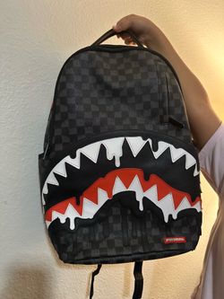 Spray ground backpack
