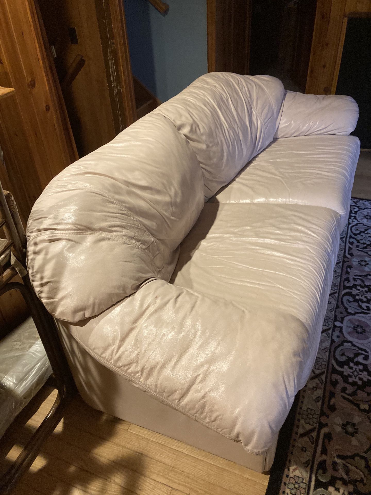 Italian leather sofa in cream blush color