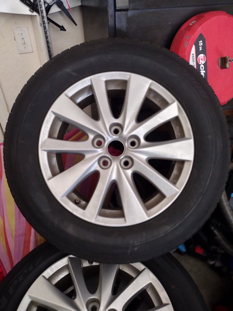 Set 4 Tires and Rims.                                                                            