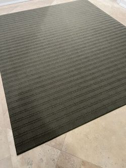 Pair of green area rugs (2 different sizes) sold separately or together 36” square $50 81” x 97” $100 Excellent condition Smoke free household