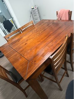 Wood dining table and 6 padded chairs