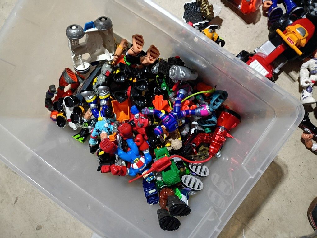 Container Of Toy Figures