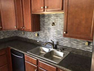 Kitchen backsplash, showers, tub surrounds/ Ceramic tile work