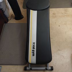 Total Gym, black,white, gold, and crome.