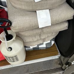 Assortment Of Outdoor Pillows And Cusions