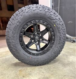 New Wheels & Tires Package Deal 17" Fuel D697 Kicker 285|70R17 Falken Wildpeak AT4W Tires WE FINANCE