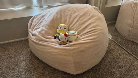 Oversized light pink beanbag