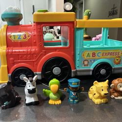 Fisher-Price Little People Big ABC Animal Train, Push-Along Toy Vehicle with Lights, Music and Smart Stages Learning Content for
