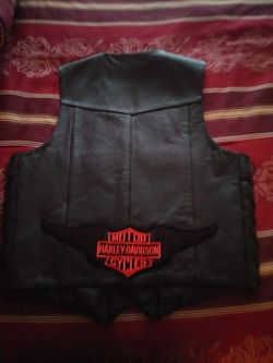 Set of 2. His and her leather vests...will separate