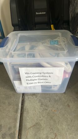 Wii Gaming system + 9 Games  + Controllers