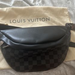 LV Discovery Bum Bag in damier graphite.