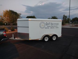 2002 American V-Nosed dual axle utility trailer