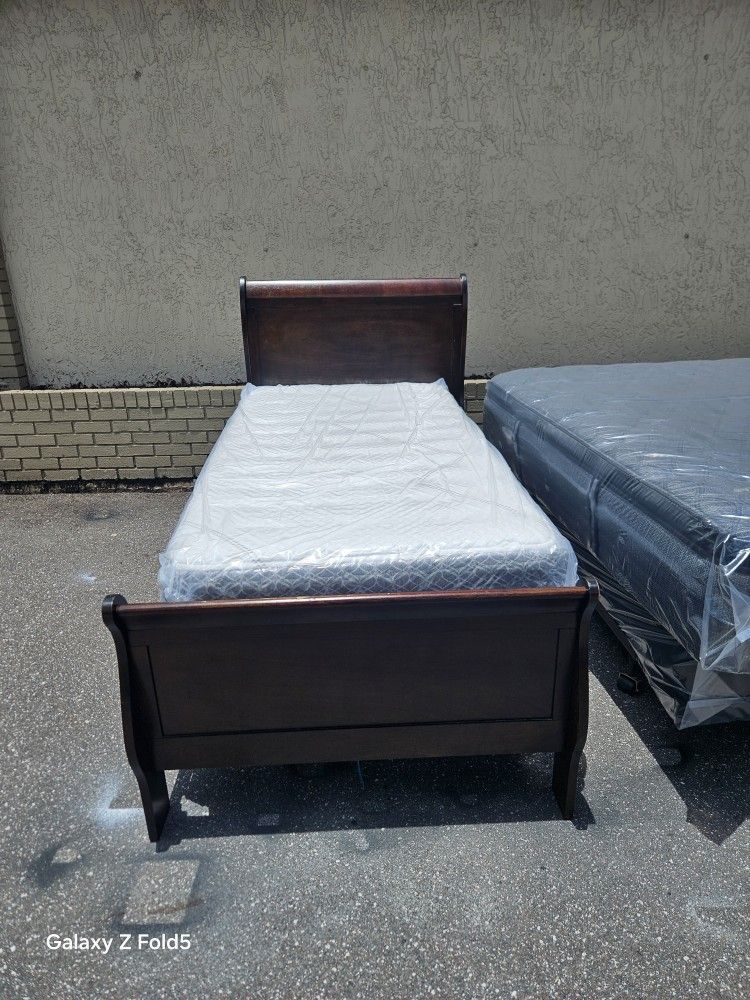 Brown Cherry Twin Size Solid Wood Bed Frame With Brand New Twins Size Plush Memory Foam Mattress And Box Spring In Plastic