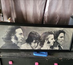 Framed black and white Beatles print
