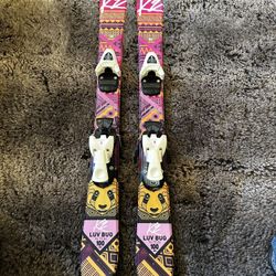 K2 Love Bug kids skis with Atomic bindings