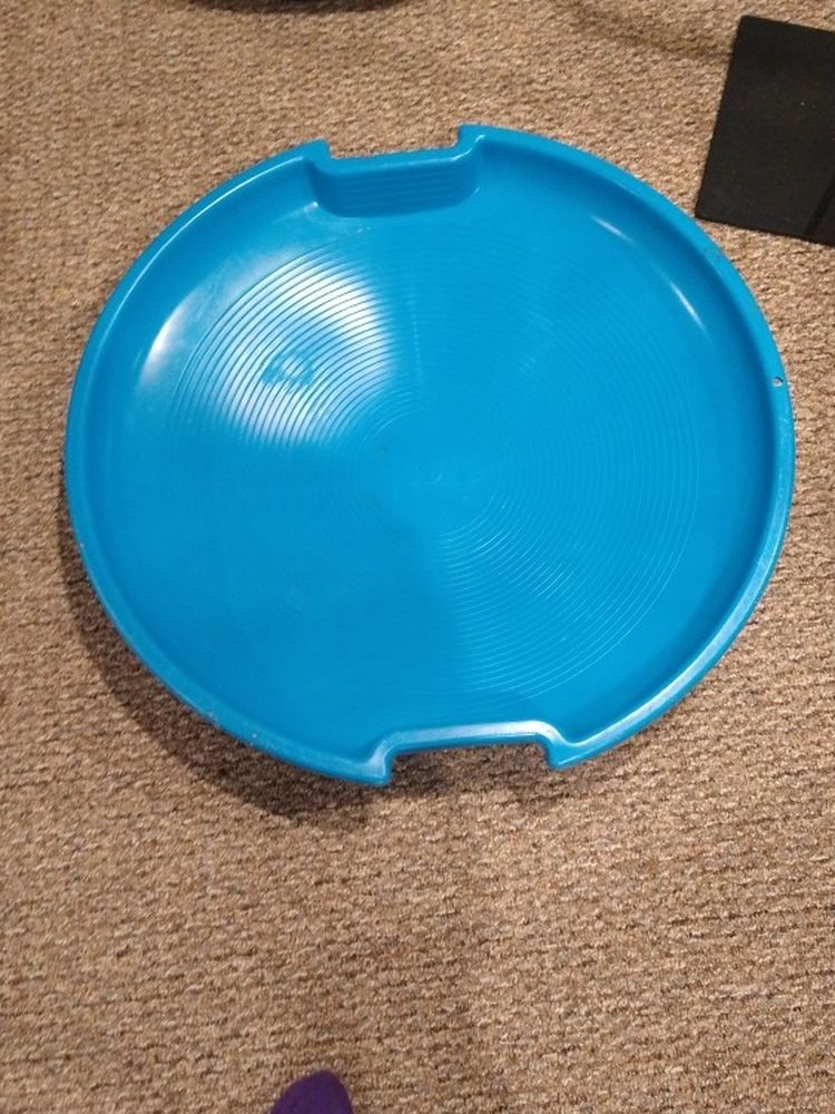 Saucer sled.