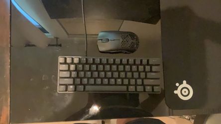 Awsome keyboard with a glorious brand mouse and mouse pad