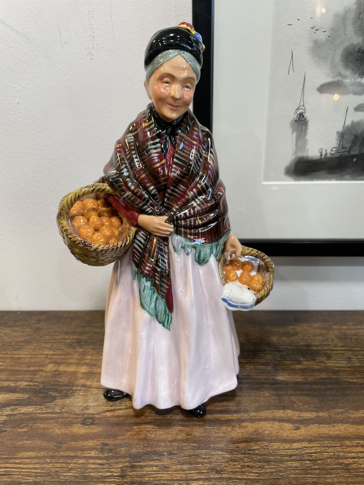 Royal Doulton highly collectible figurine “The Orange Lady”.