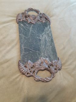 a wine an cheese marble tray .