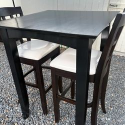 Bistro dining table with two chairs