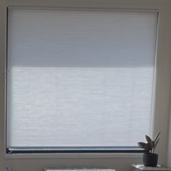 White cellular shade 71” wide by 72”  length