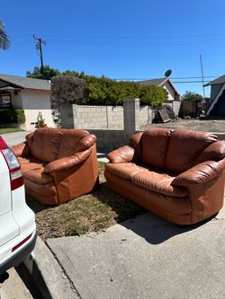 Free curb side Brown Leather Loveseat and Armchair Set