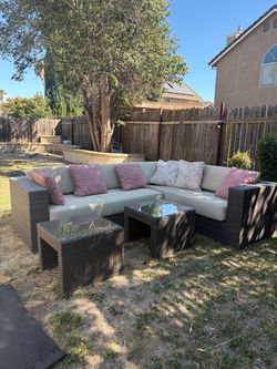 Great condition 2 couch with sunbrella cushions