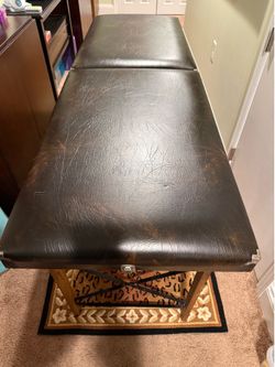 Massage table