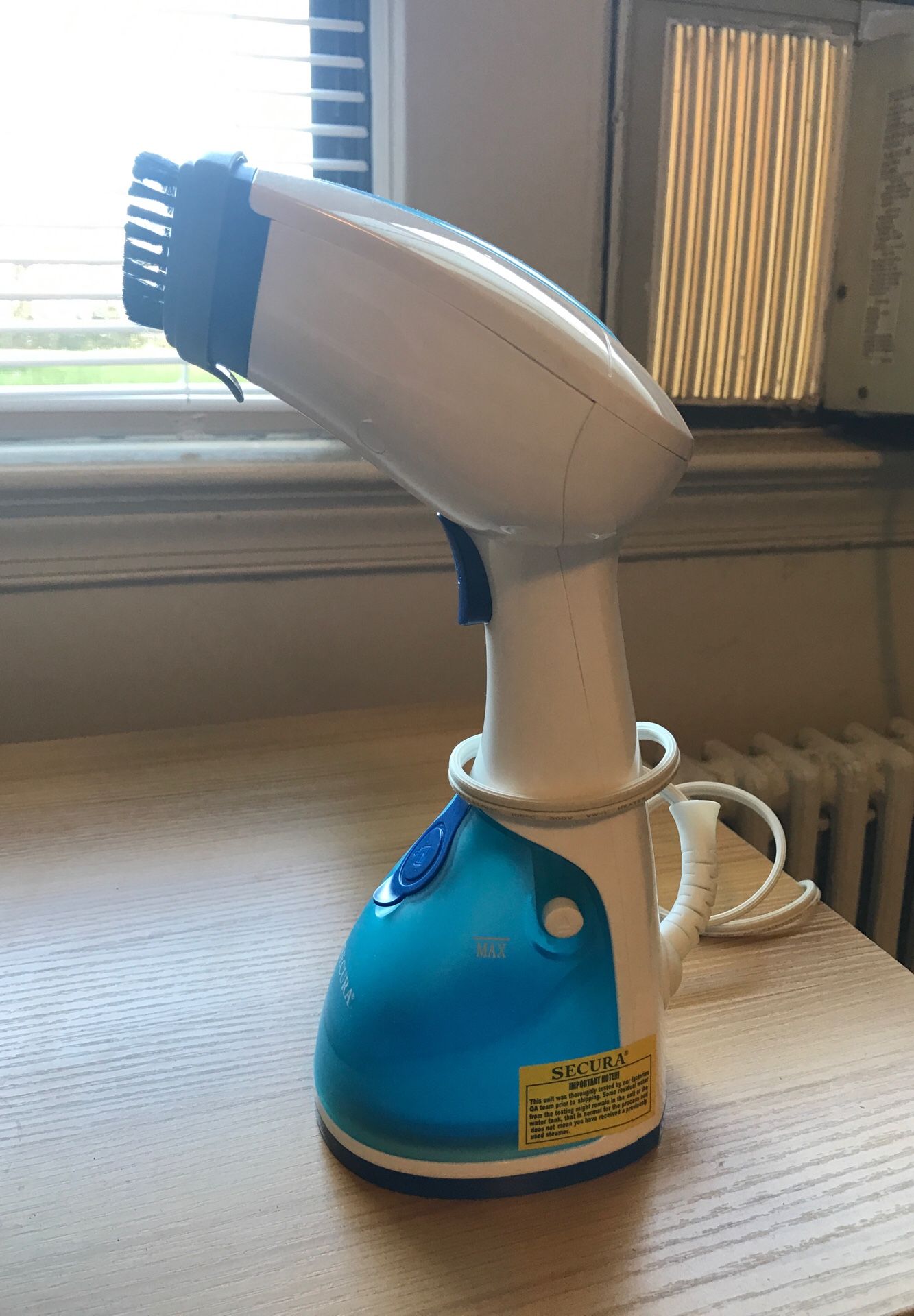 Handheld steamer