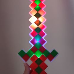 Light-Up Pixel Toy Sword, often Associated w/ the Game Minecraft.