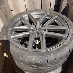OEM Lexus IS F Sport wheels (18”) with tires.