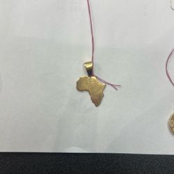 14k Yellow Gold Africa Pendant $519.99