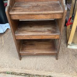 A wood shelf it’s 28 inches tall 18 inches wide and 11 inches deep
