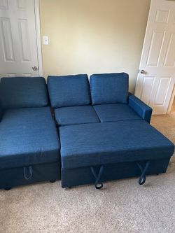 Lincoln Fabric Reversible Storage Sectional with Pullout Bed