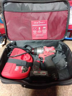 Milwaukee M12 Drill with Battery and Charger in carry bag