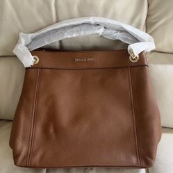 Brand New MK Purse.  It is a Very Beautiful Purse.  