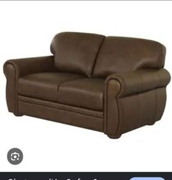 Brown leather loveseat