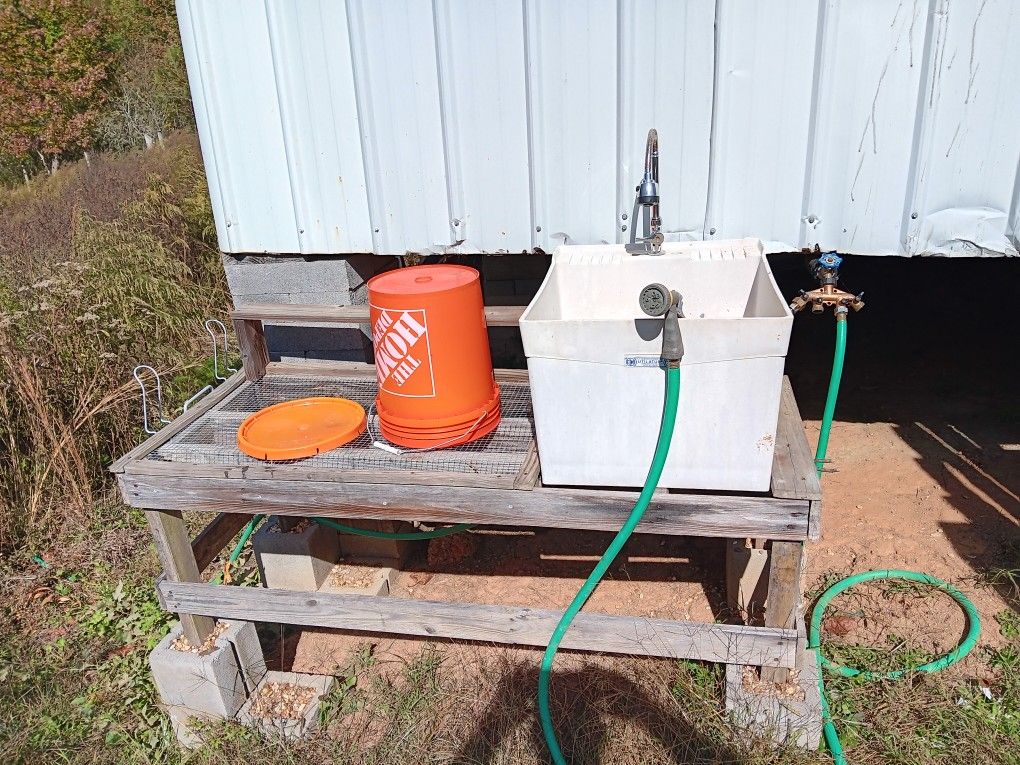 OUTSIDE SINK AND STAND