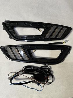 LA Zona Auto Parts 15 16 17 Ford Focus Fog Light Bezel plus wiring harness Fog light not included 