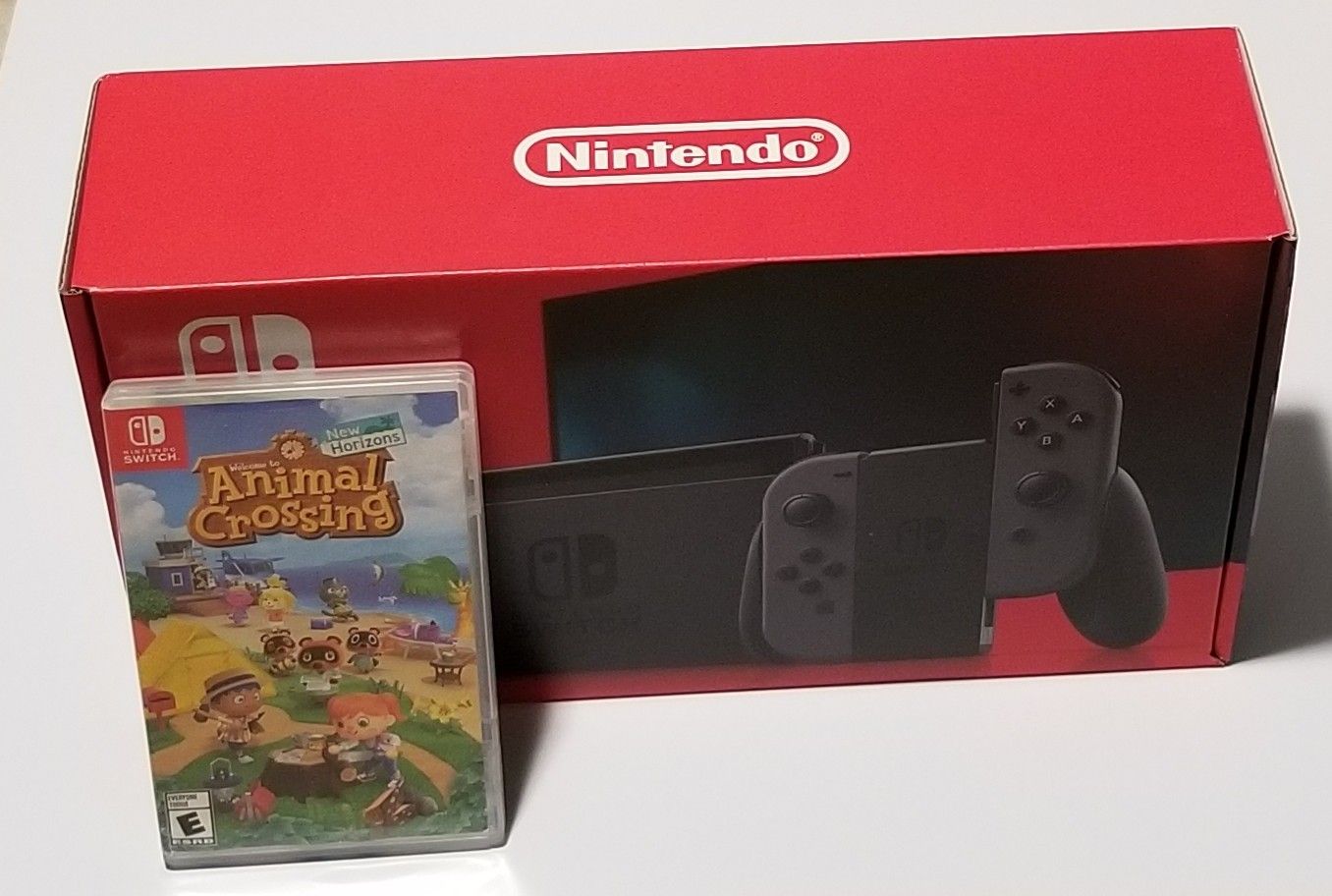 Nintendo Switch V2 + Animal Crossing New Horizon