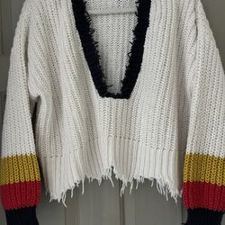 Wildfox- women's sneak out stripe Palmetto sweater and white with a deep V-neck and distressed edges