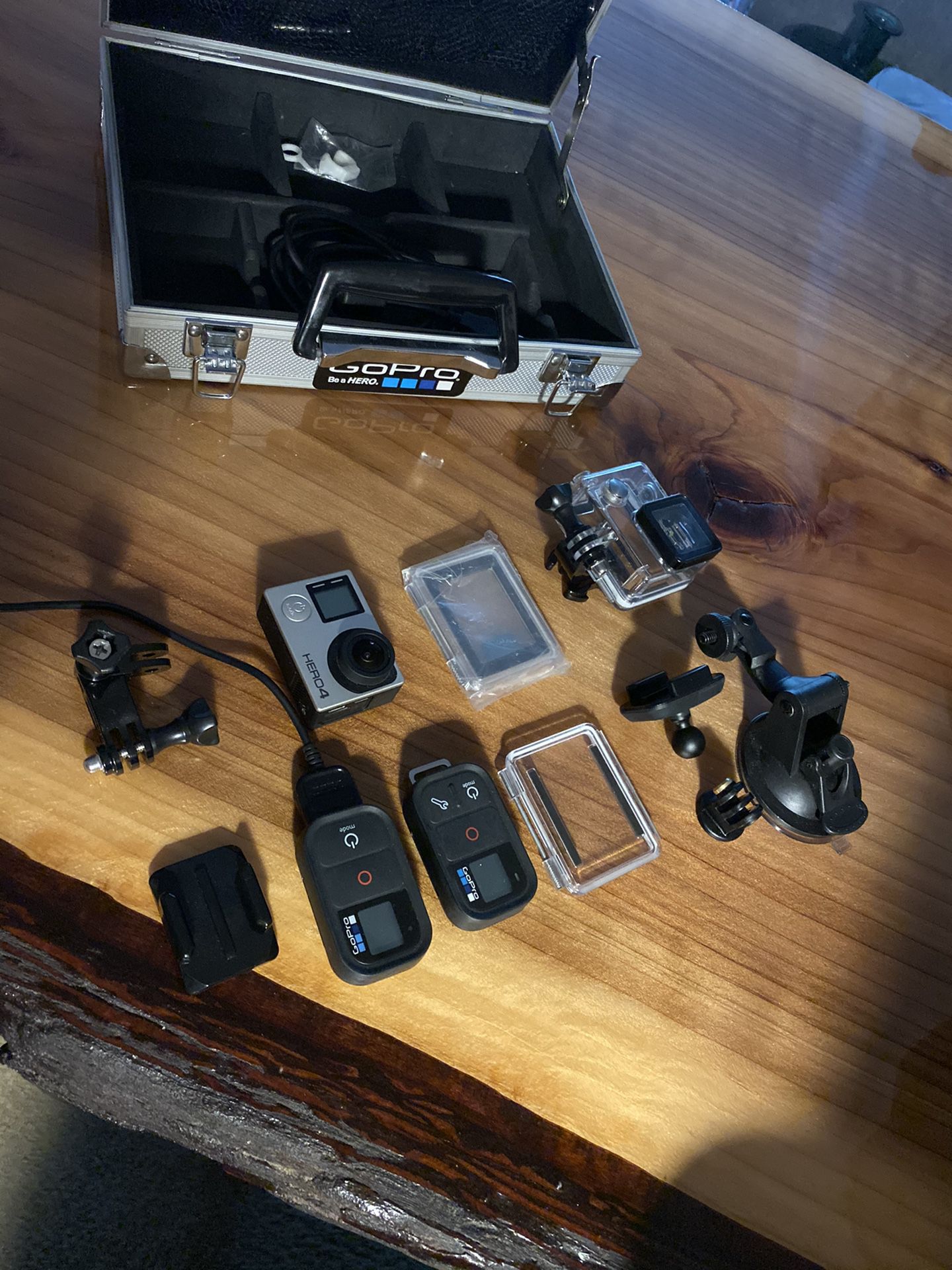 Hero 4 GoPro w/case 2 remotes, camera mount case etc