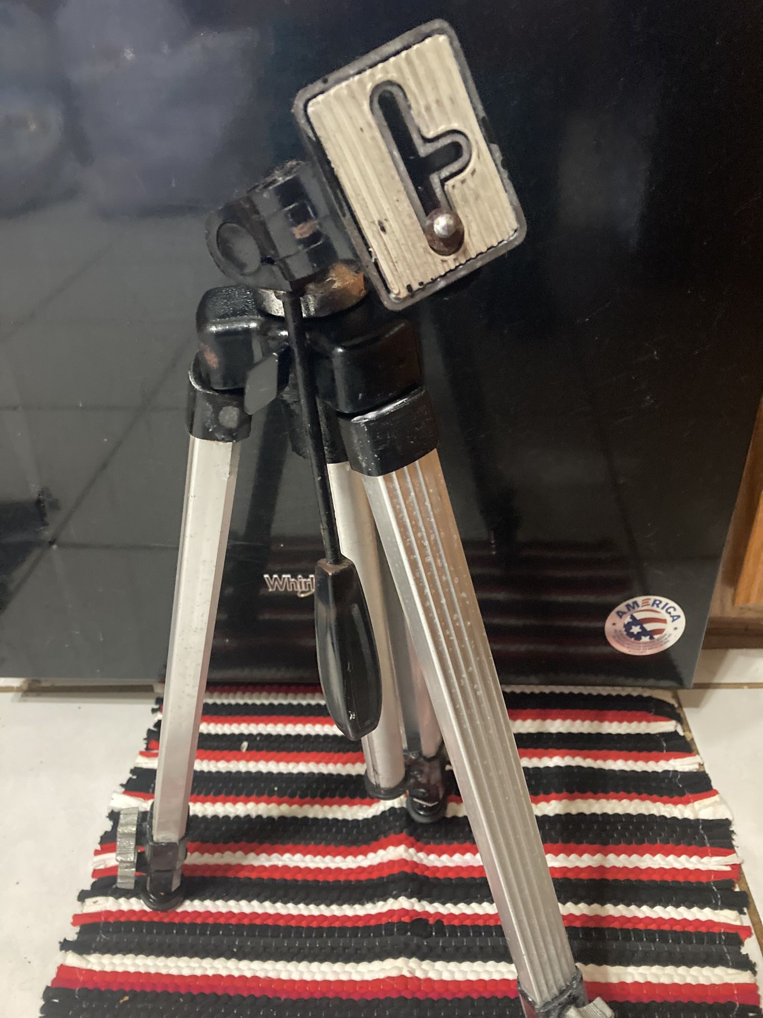 ADJUSTABLE TRIPOD WITH CAMERA MOUNTING BRACKET INCLUDED