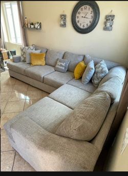 Super comfortable beige sectional couch from Jerome’s