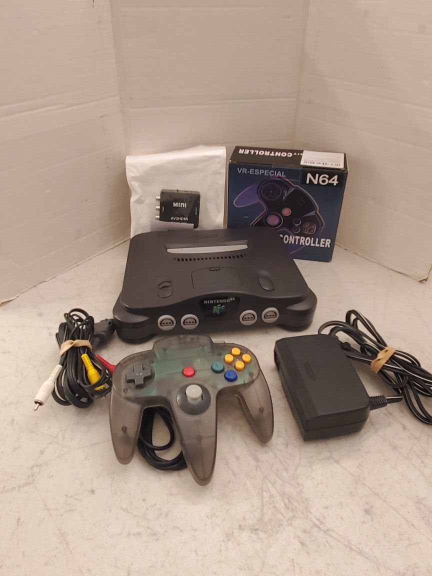 Nintendo N 64 video game system with new HDMI adapter and controllers so will work on smart TV